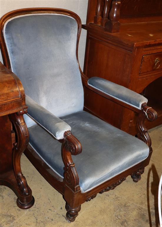 An early Victorian rosewood blue upholstered open armchair, W.72cm, D.80cm, H.102cm